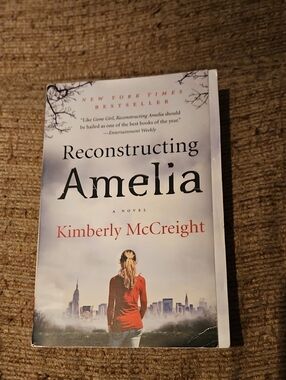 Reconstructing Amelia by - White Cover with Red Accent